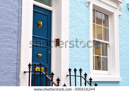 notting hill in london england old suburban and antique    wall door  Royalty-Free Stock Photo #300616244