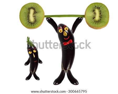 Creative food concept. Funny eggplant raises the bar of kiwi.