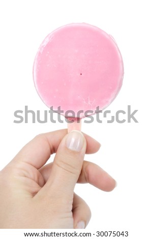 Woman hand holding pink fruit ice cream