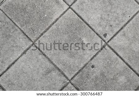 Grey brick stone street road, pavement texture, background