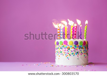Birthday cake on a pink background