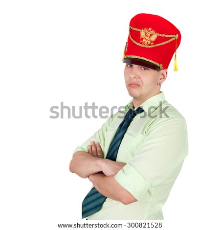 young handsome businessman in the hussar cap