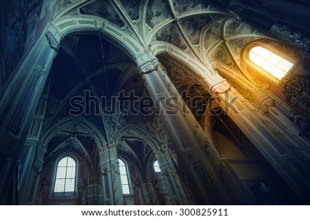 sun rays beaming through the old window of Latin Cathedral