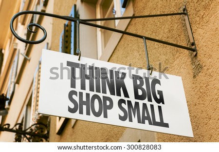 Think Big Shop Small sign in a conceptual image Royalty-Free Stock Photo #300828083