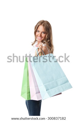 Shopping pretty woman with paper bags isolated on white