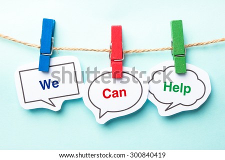We can help bubble with clip hanging on the line with blue background. Royalty-Free Stock Photo #300840419