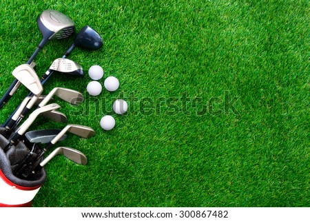 Golf ball and golf club in bag on green grass Royalty-Free Stock Photo #300867482