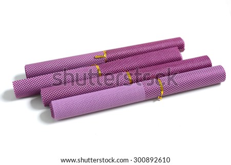 Roles of color paper. Color paper rolled and piled