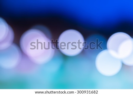 LIGHT CIRCLES ON BLURRED BACKGROUND
