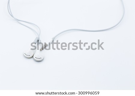 White earbuds isolated on white background