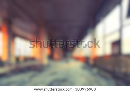 Blurred modern hipster background of an abandoned building interior.