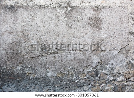 Old textured wall from stone in Rome
