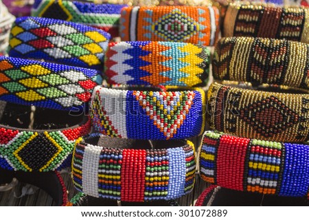 Local craft market in South Africa. Unique handmade colorful beads  bracelets, bangles. Craftsmanship. African fashion. Traditional ornament, accessories.