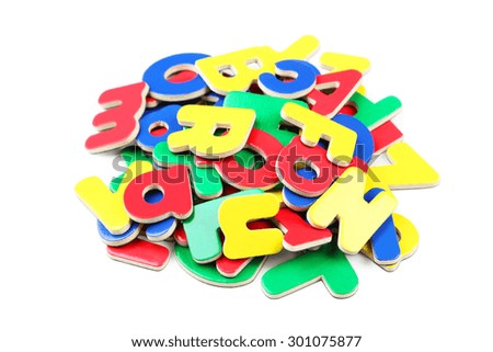 Magnetic plastic letters isolated on white