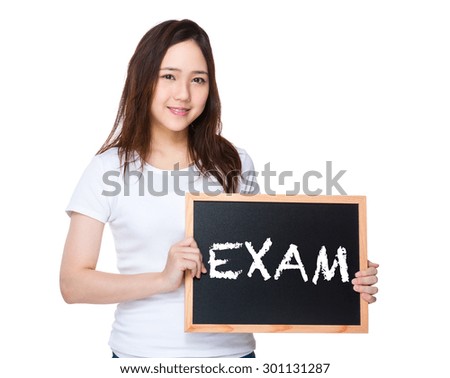 Young woman hold with blackboard showing a word exam