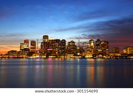 Boston City Skyscrapers, Custom House and Boston Waterfront at night from East Boston, Boston, Massachusetts MA, USA. Royalty-Free Stock Photo #301154690