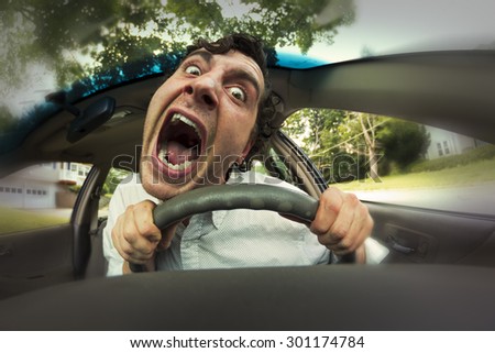 Silly man gets into car crash and makes ridiculous face Royalty-Free Stock Photo #301174784