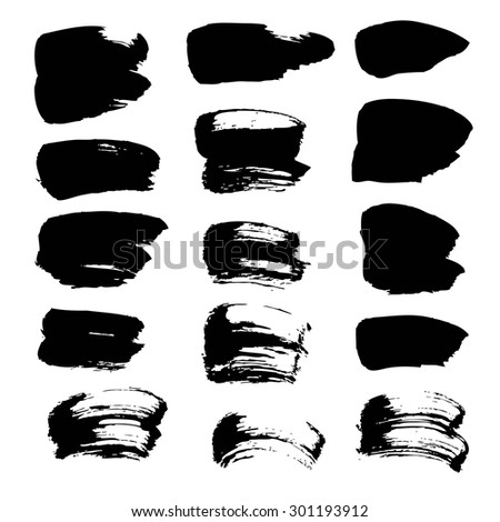 Abstract spots of black paint and ink isolated on a white background 1