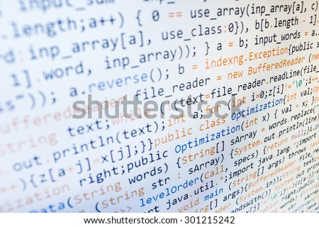 Software developer programming code on computer. Abstract computer script source code. Shallow depth of field, selective focus effect. Code text written and created entirely by myself