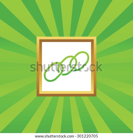 Image of chain fragment in golden frame, on green abstract background