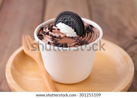 cookie cup cake on wooden table