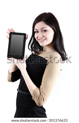 Business woman with a tablet computer, isolated on a white background