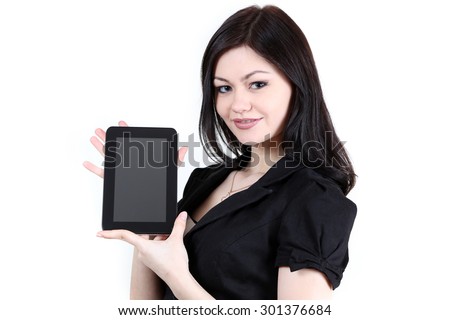 Business woman with a tablet computer, isolated on a white background