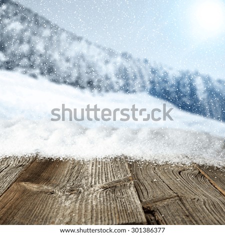 texture of winter landscape and gray wooden desk space 