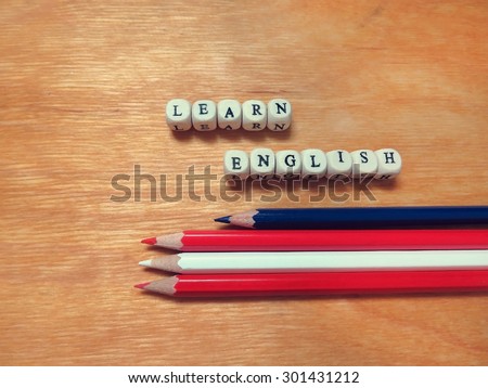 Caption beads - Learn English and colored pencils        