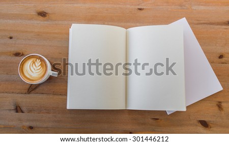 Blank catalog, magazines,book mock up on  wood background with cup of coffee