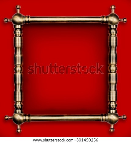 Hardware design concept. Old scratched bronze pipes frame with light reflections made for text or picture isolated on red background. two clipping path included