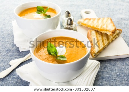 Roasted tomato soup cooked with organic heirloom tomatoes and served with grilled cheese sandwich.