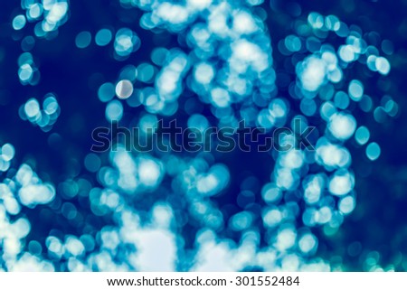 Background of blurred  natural bokeh with sun light
