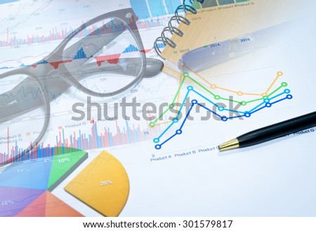 Financial papers, pen supplies closeup.business concept
