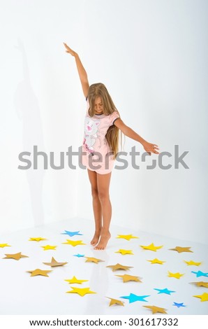 Full length studio photo girl wearing summer dress standing on white background