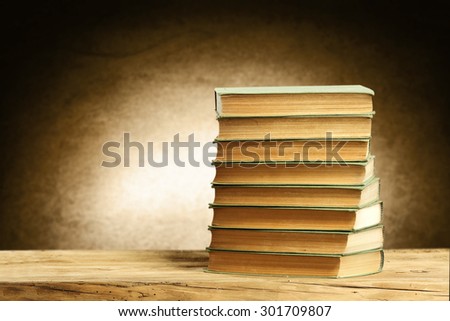 shelf of wood and books on board 