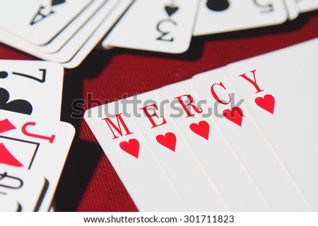 MERCY word written on card