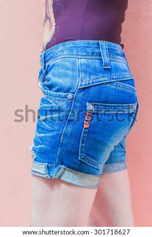 Half a beautiful women wearing jeans, Background of fashion jeans.