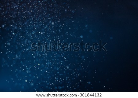 abstract dark bokeh lights background , defocused background