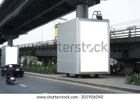 Blank poster billboard mockup in the middle of road under the highway, template design for see how your design will look in outdoor advertising