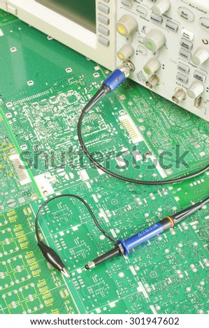 Electronics ocilloscope probe on the printed circuit boards