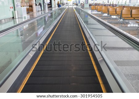 Conveyor bell for moving people in modern airport