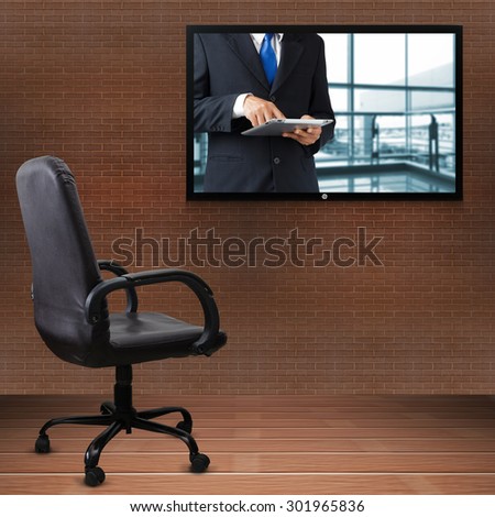 Office chair and TV screen 
