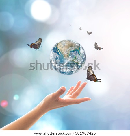 Mother nature earth with butterfly for world environment day, csr with people concept: Element of this image furnished by NASA Royalty-Free Stock Photo #301989425