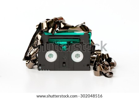 Technology,recording,movie,mini,Mini DV videotape defective on a white background.