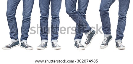 Regular Fit Straight Leg Jeans and Retro Canvas High Top Sneakers isolated on white background, selective focus (detailed close-up shot) Royalty-Free Stock Photo #302074985