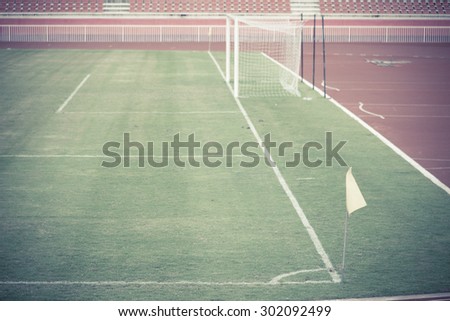 Green grass in soccer stadium: Ball on the green glass with copy space.