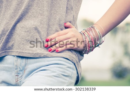 female with bracelets