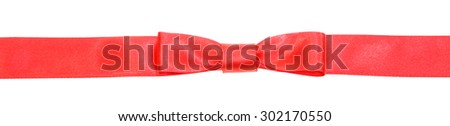 real red bow knot on narrow satin ribbon isolated on white background