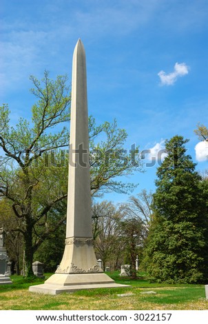 Memorial obelisk grave marker at historic Spring Grove Cemetery in Cincinnati Ohio USA.  Spring Grove is the second largest cemetery in the United States and was established in 1845.